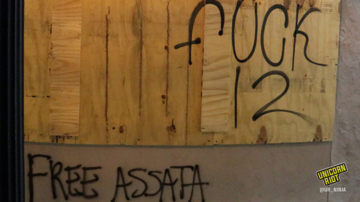 Free Assata and Fuck 12 graffiti