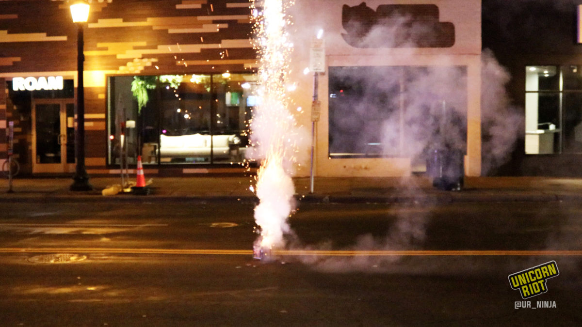 Fireworks are let off on Hennepin Ave in uptown Minneapolis