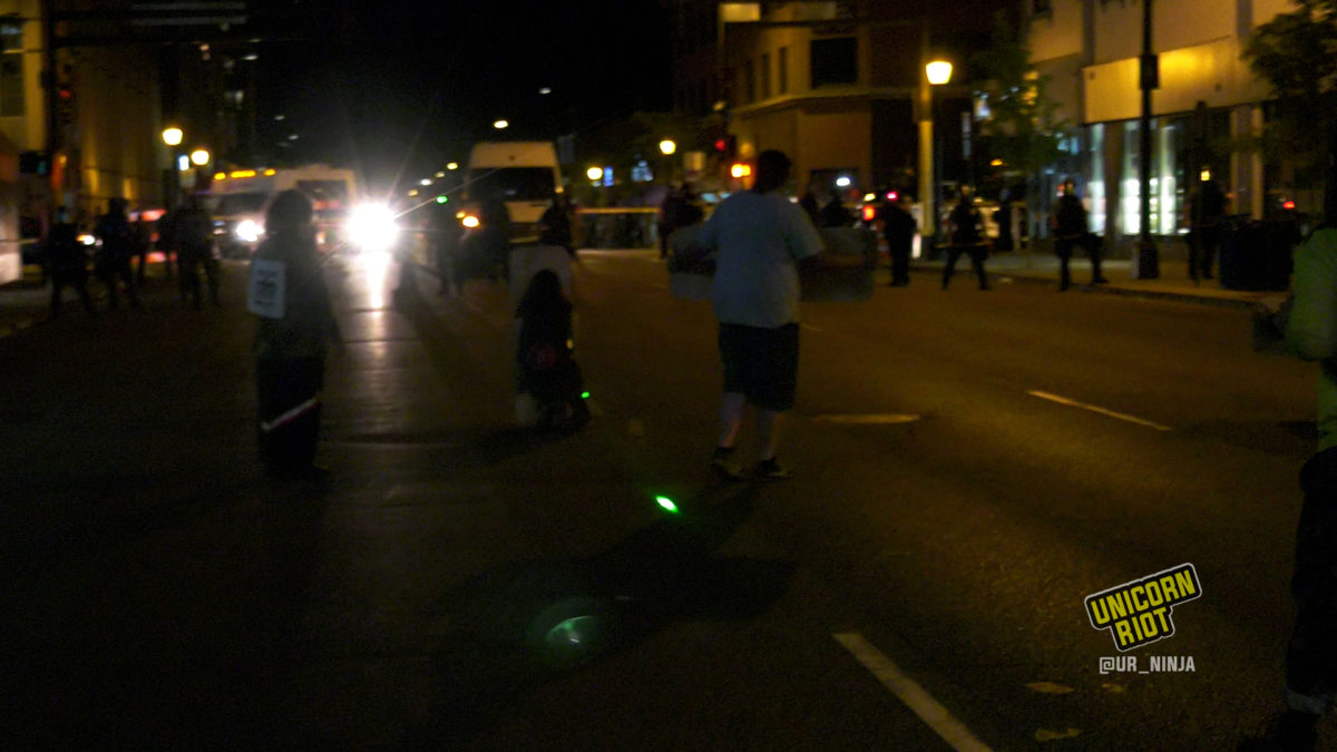 The green lasers were used on June 3 against protesters angry about the news of Winston Smith’s death at the hands of the federal task force. When a group of protesters approached the police line that formed before the crowd was dispersed, an officer turned his laser on and pointed it at at least three people. That was the first time our reporters have seen police use lasers against protesters in Minneapolis in the last six years. (Protesters who have allegedly pointed laser pointers at police have been repeatedly arrested and charged.)