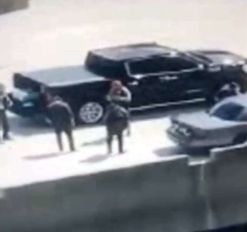 white militia members gather on parking ramps in indianapolis at height of george floyd uprising