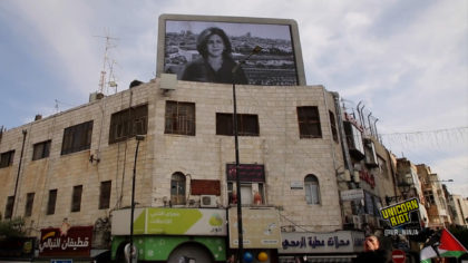 large billboard of shireen abu akleh in jenin city during her funeral. she was a journalist shot by israeli forces on may 11, 2022.
