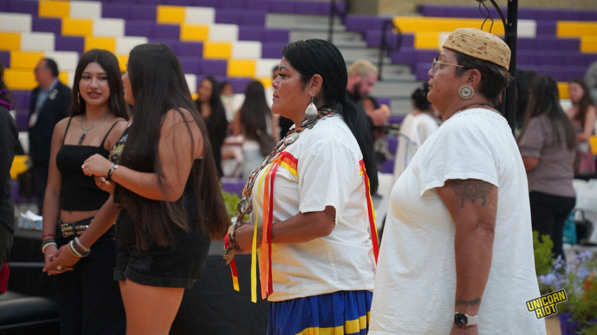 Bird dancers accompany the welcome procession by traditional bird singers at the "Road to Healing" listening session at the Sherman Indian School in Riverside, California on Friday, August 4, 2023.