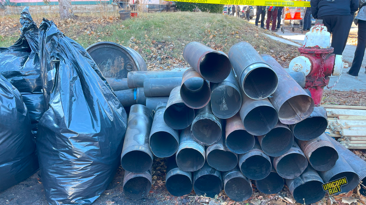 Stovepipes pile up outside Camp Nenookaasi as supporters prepare to transport them to the next site.